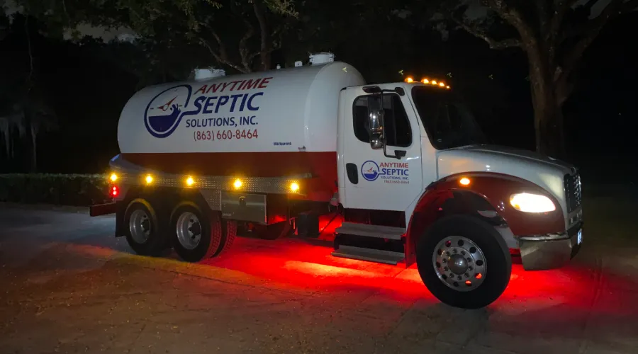 The Anytime Septic Solutions pump truck on a night time emergency call. We offer Emergency Septic Tank Pumping Services in Lakeland Florida.